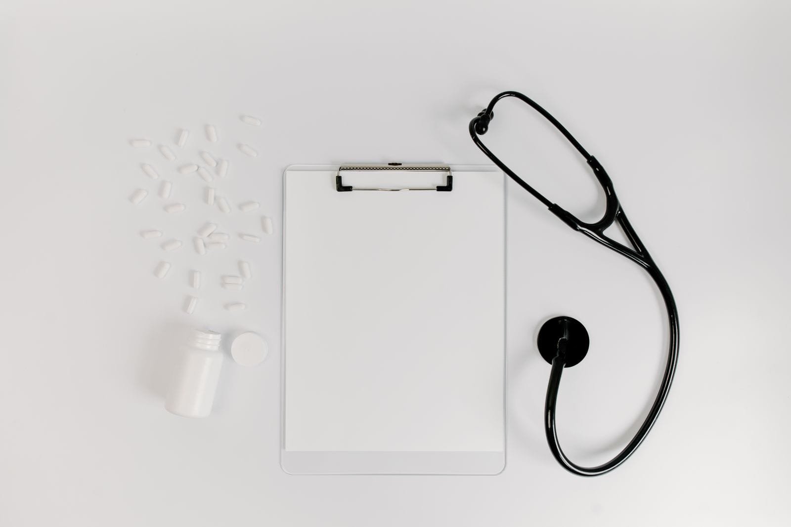 Stethoscope and clipboard representing a checklist for choosing a rheumatologist
